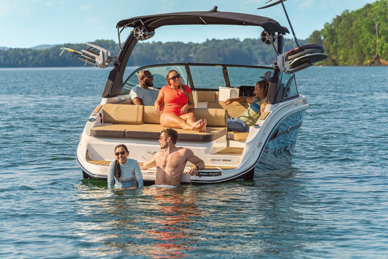 People aboard an SDX 250 Surf