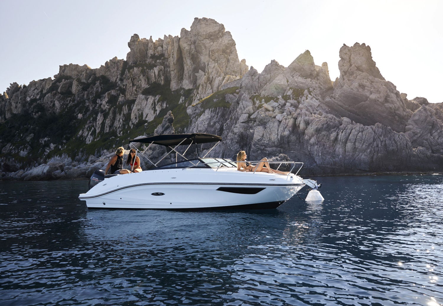 Sea Ray sunsport 230 outboard white side view