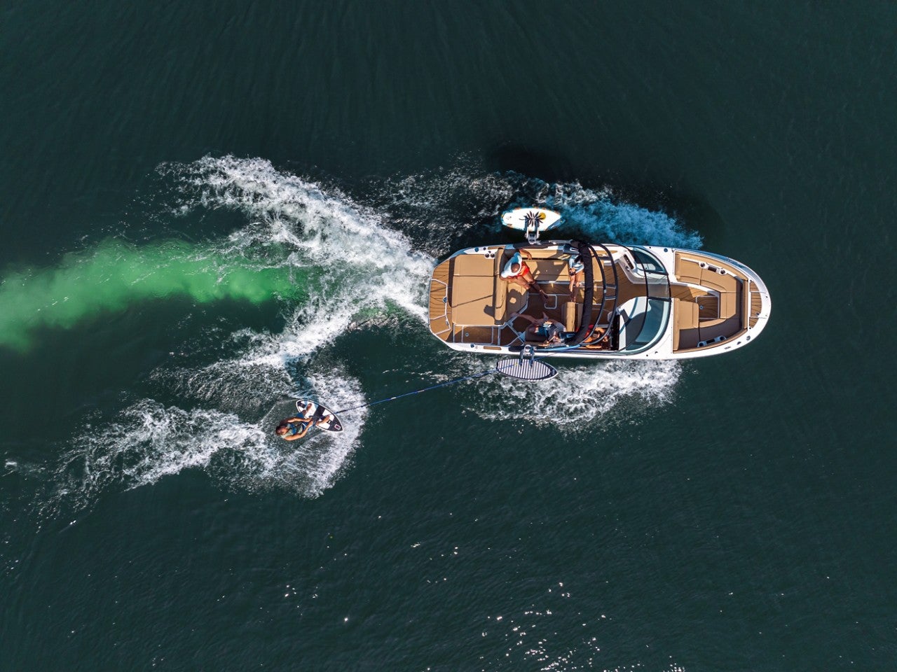 SDX 250 Surf aerial view with a man wakesurfing