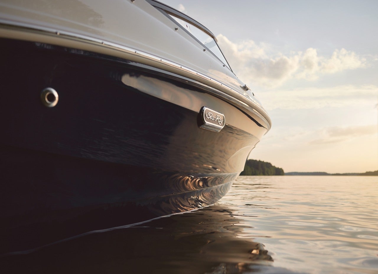 SPX 190 Outboard hull and badge detail at sunset