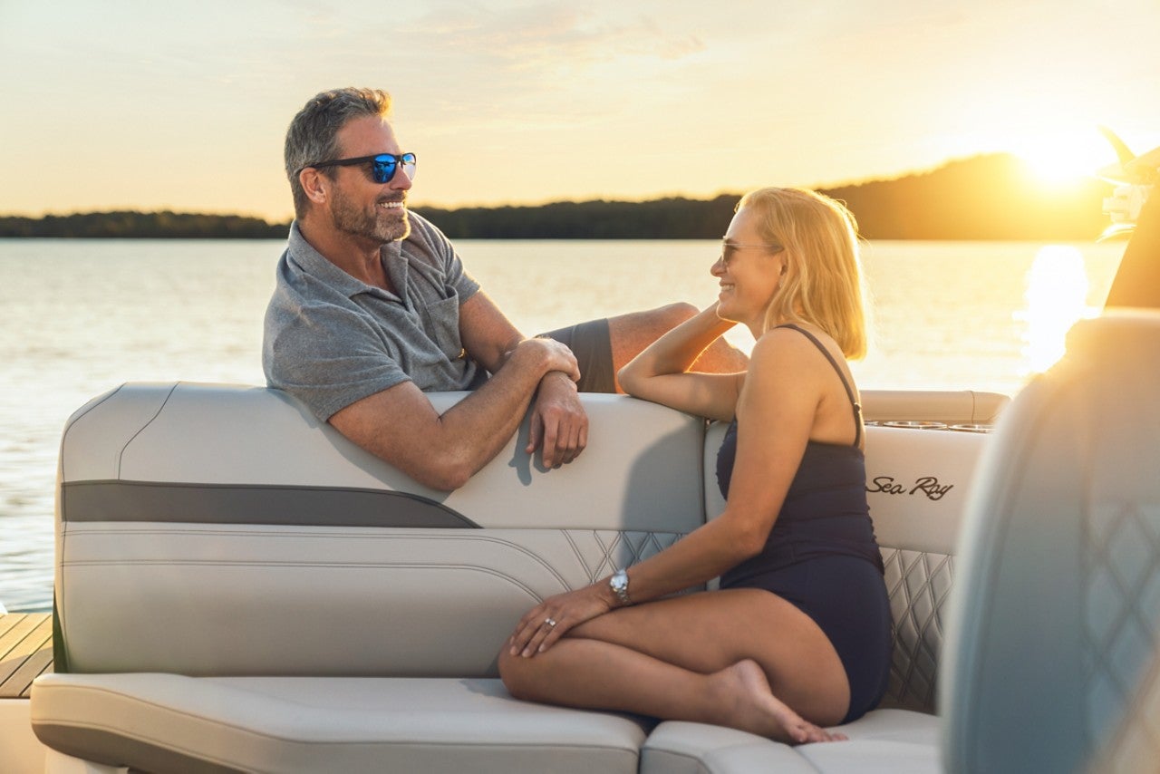 Couple aboard an SLX 260 Surf