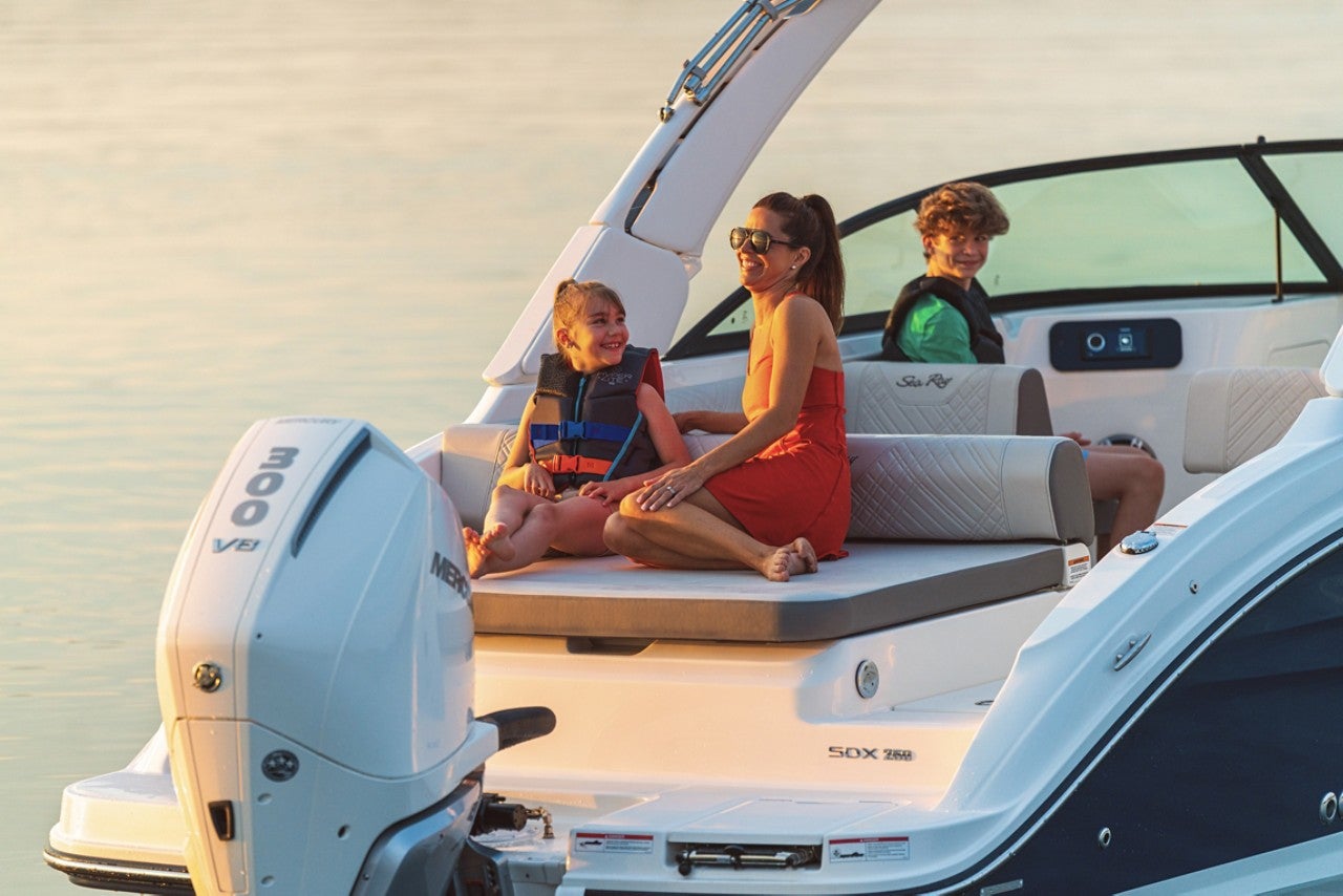 Family aboard an SDX 250 Outboard